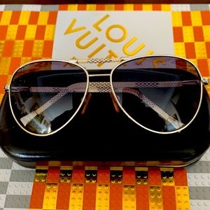 LV aviator sunglasses with cream leather logo details